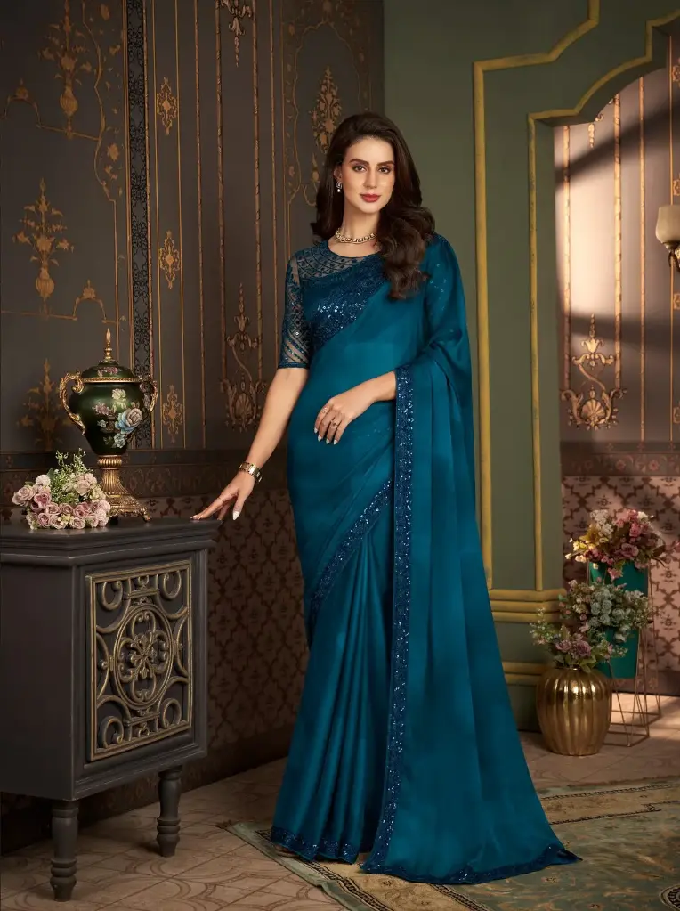 Peacock Blue Satin Chiffon Saree Adorned with Intricate Embellishments